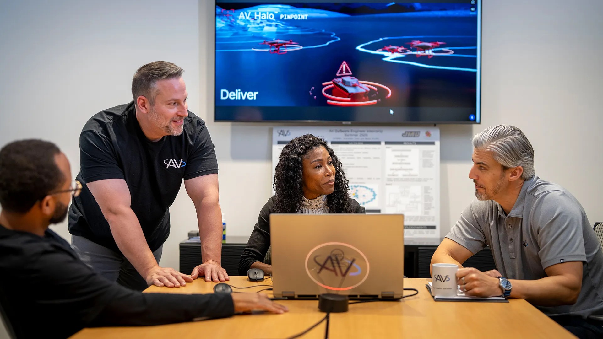 AV employees in a meeting