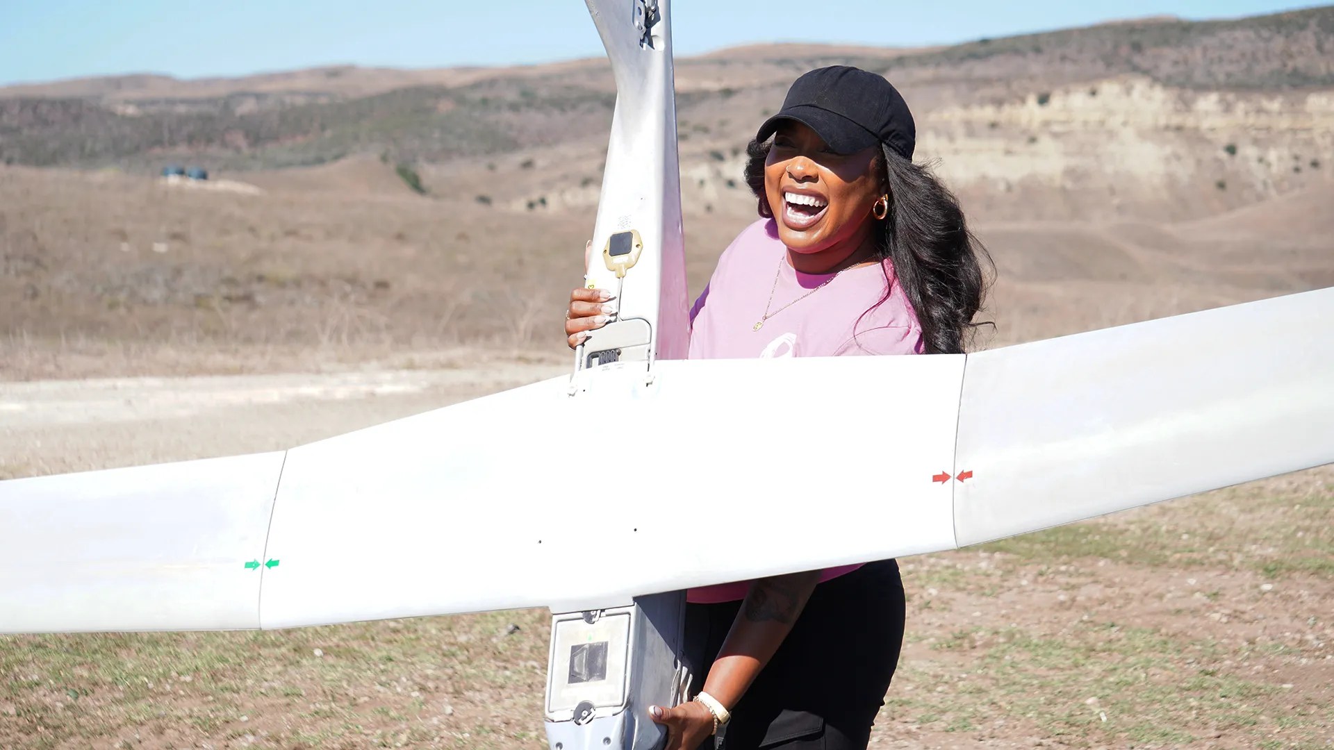 Woman holding aircraft