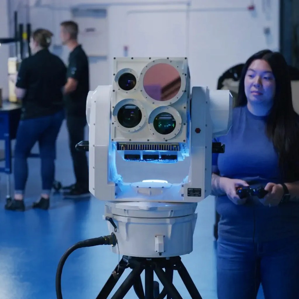 Woman operating technology